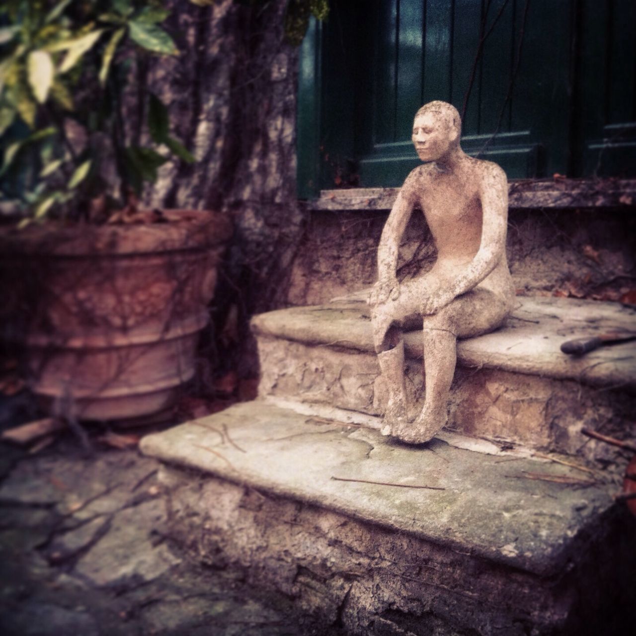 statue, sculpture, human representation, art, art and craft, creativity, old, animal representation, carving - craft product, stone material, weathered, no people, built structure, day, outdoors, stone, focus on foreground, wall - building feature