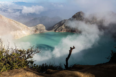 Scenic view of volcanic mountain against sky