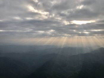 Scenic view of mountains against sky during sunset