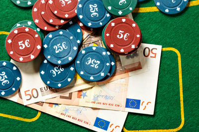 High angle view of coins on table