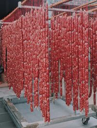 Red lanterns hanging in market stall