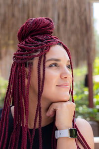 Portrait of young woman with eyes closed