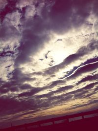 Scenic view of cloudy sky at sunset