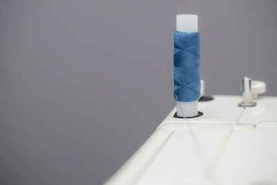 Close-up of blue table against white background