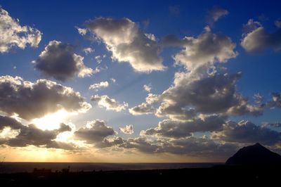 Scenic view of silhouette landscape against sky during sunset