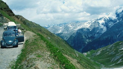 Scenic view of landscape against cloudy sky