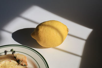 Close-up of lemon on table