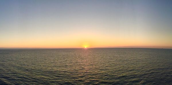 Scenic view of sea at sunset