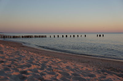 Scenic view of sea at sunset