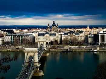 High angle view of bridge over river against cloudy sky