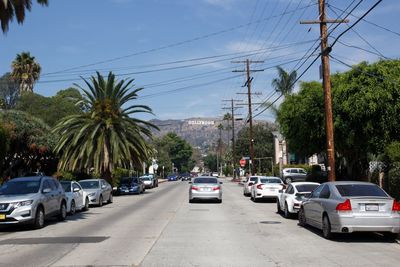 Cars on road against sky