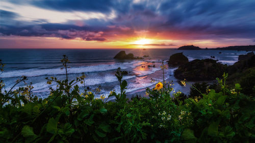 Scenic view of sea against sky during sunset