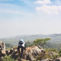 Man standing on rock formation