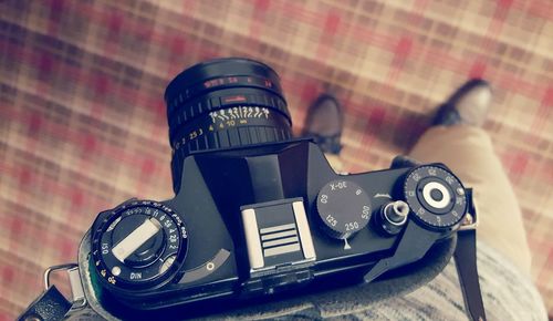 Close-up of camera on table