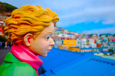 Close-up portrait of boy looking away