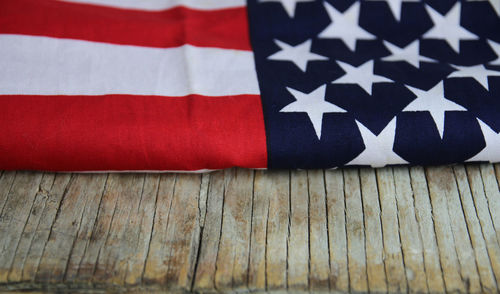 Close-up of american flag on table