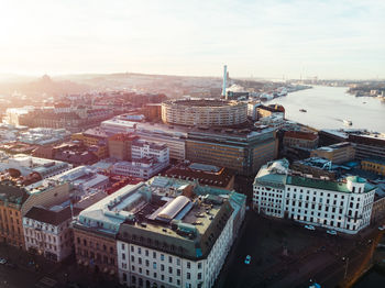 High angle view of buildings in city against sky