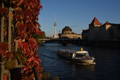 High angle view of boat moving on river against fernsehturm