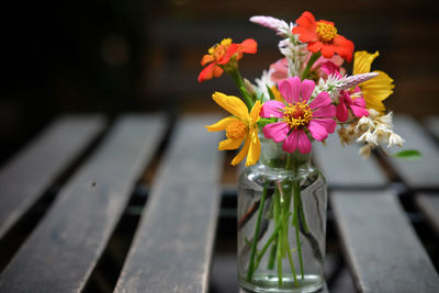 Close-up of pink flower vase on table