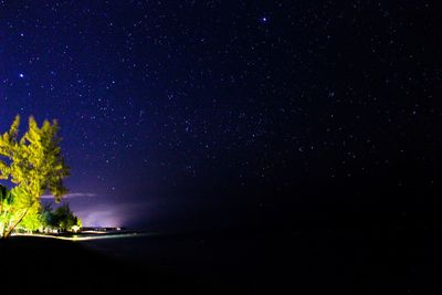 Scenic view of star field against sky at night