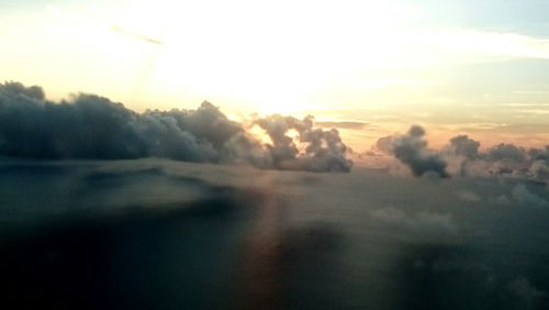 Sun shining through clouds