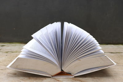 Close-up of open book on table