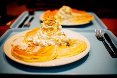 Close-up of breakfast served on table