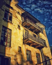 Low angle view of old building against sky