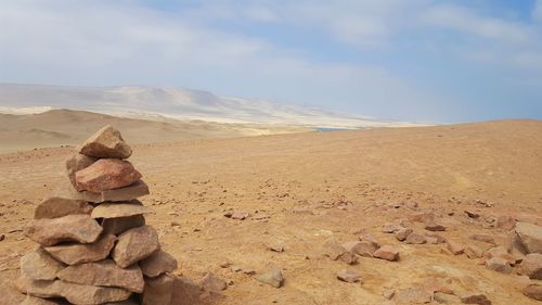 Scenic view of desert against sky