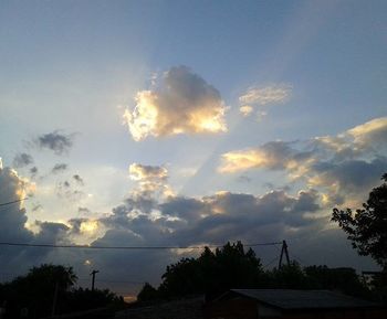 Scenic view of landscape against sky at sunset