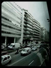 Cars moving on road in city