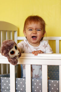 Portrait of cute baby at home