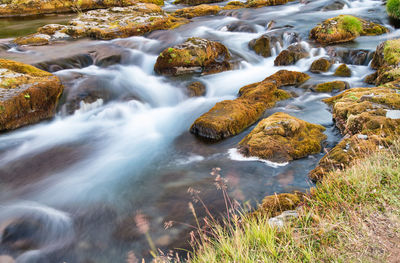 Stream flowing through rocks