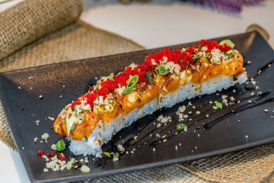 Close-up of sushi served on table