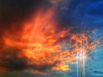 Low angle view of cloudy sky at sunset