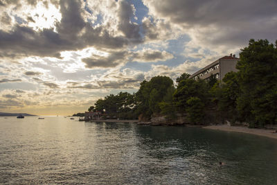 Scenic view of sea against sky at sunset