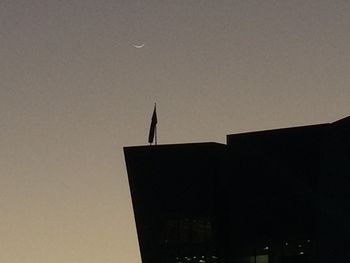 Low angle view of buildings against clear sky