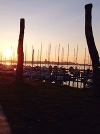 Sailboat in sea at sunset