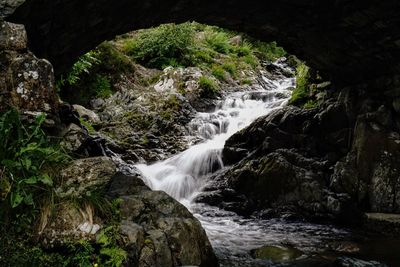 Water flowing under the ashness bridge in keswick uk