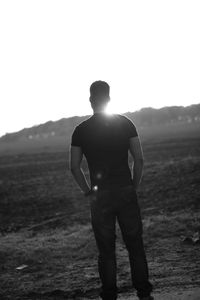 Silhouette of woman standing on landscape