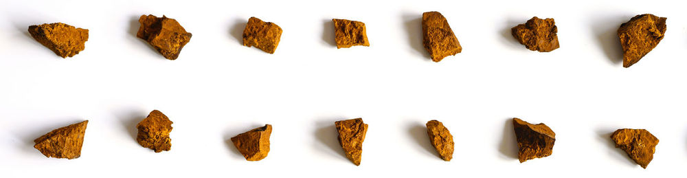 Panoramic view of cookies against white background