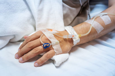 Close-up of hands on table