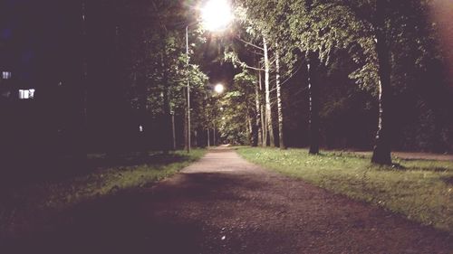 Illuminated street lights at night