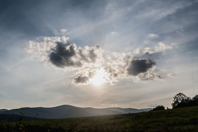 Scenic view of landscape against sky during sunset