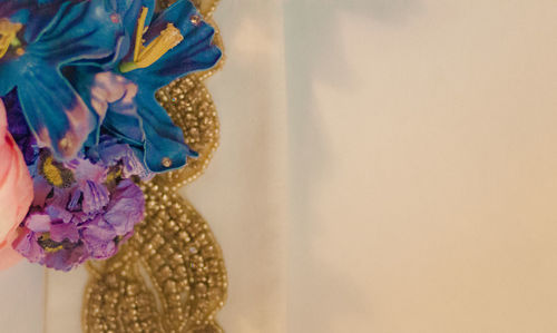 Close-up of flowers over white background