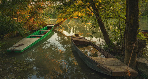 Two boats on a river during sunset