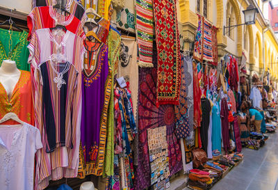 Rear view of woman standing in market