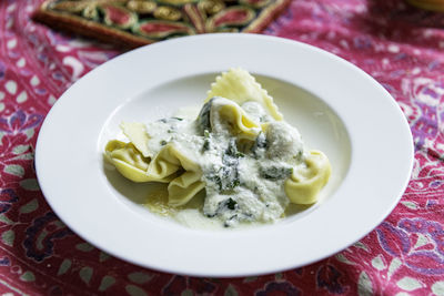 Close-up of pasta in plate on table