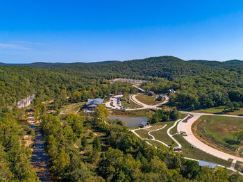 High angle view of landscape against blue sky