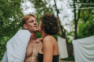 Young couple standing outdoors